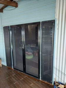 Framed glass door installation Eimeo QLD