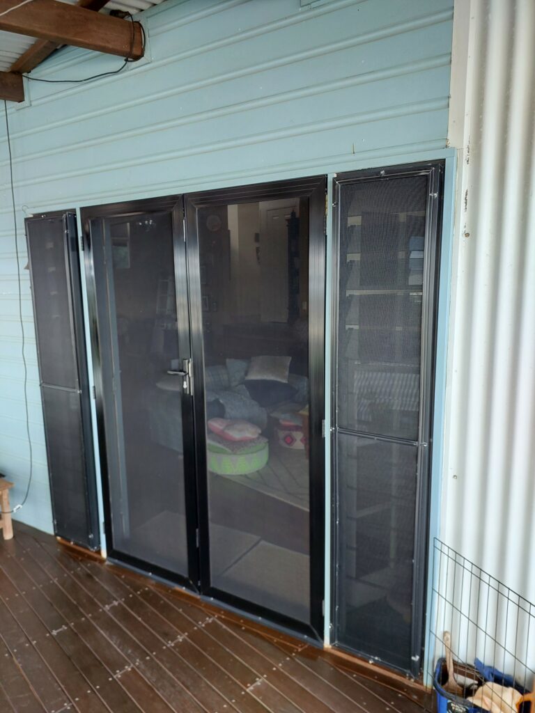 Framed glass door installation Eimeo QLD