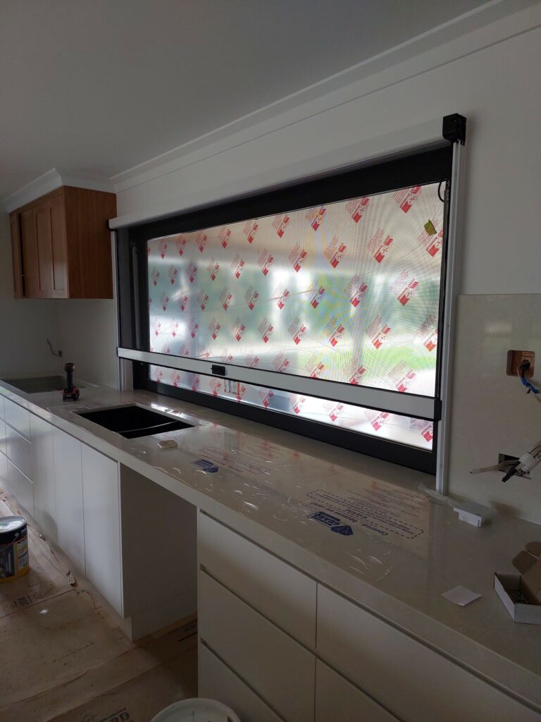 Sliding retractable flyscreen installation Mackay Racecourse
