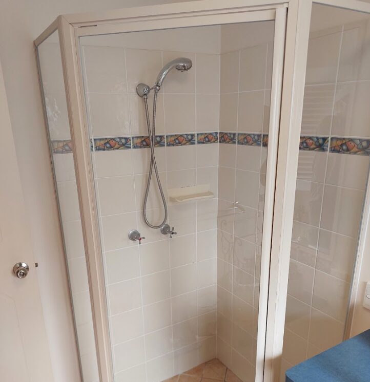 Framed shower screen installation Bucasia. QLD